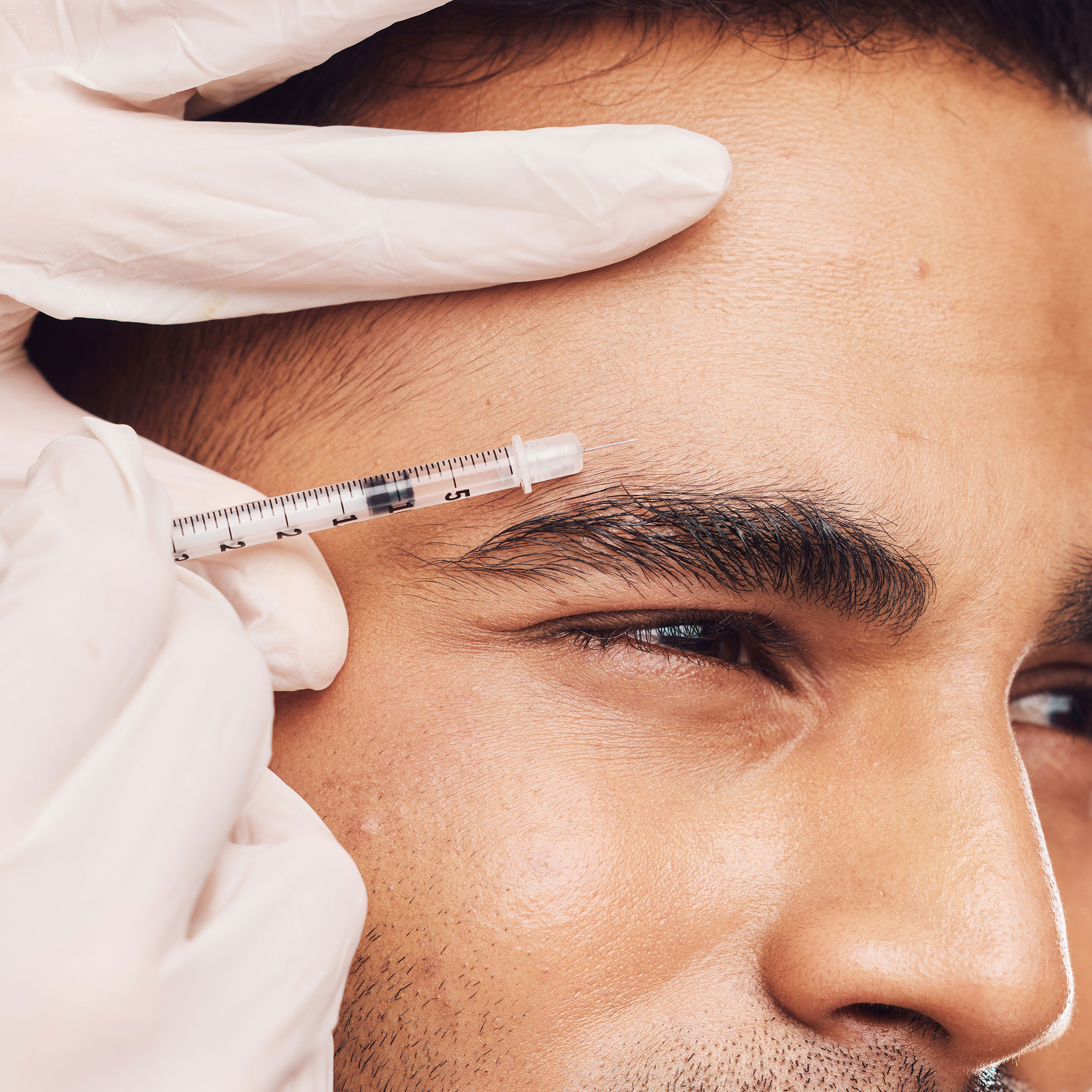 up close image of a man receiving an injection of BOTOX